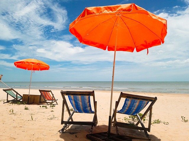 two deck chairs looking out to sea in the best place to retire in thailand